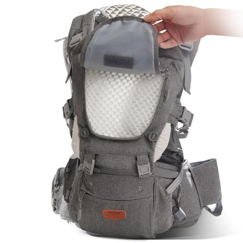 Adjustable baby carrier backpack with storage compartments and ergonomic design.